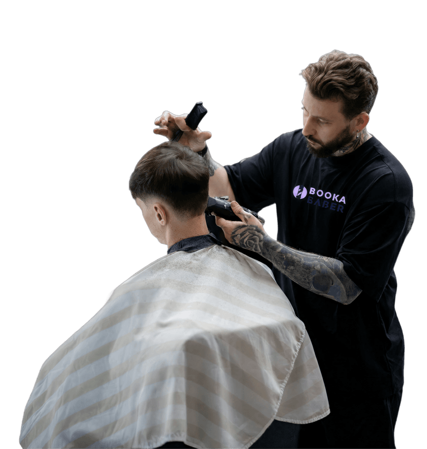 Barber giving a client a fresh haircut
