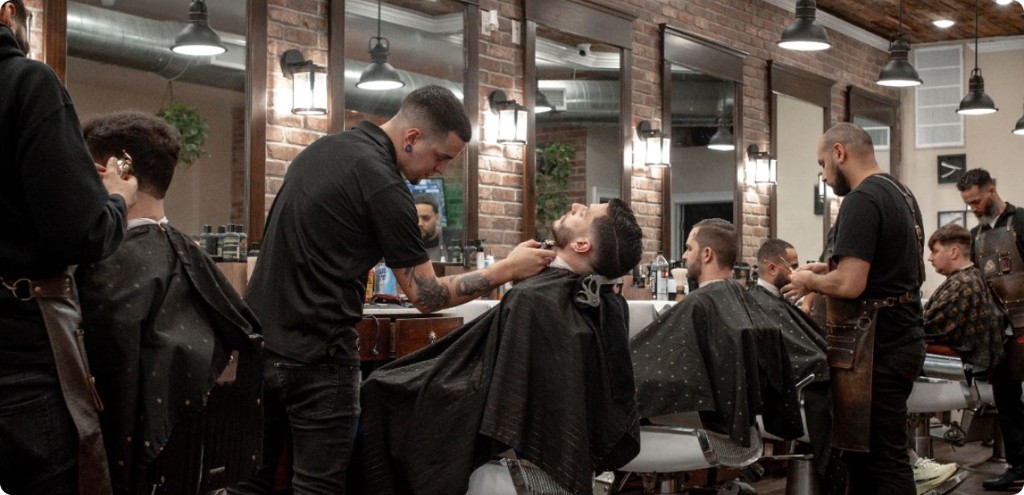 Barbershop team serving clients